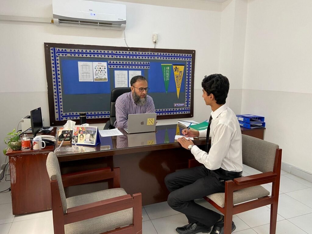 The researcher meets with Mr. Nasir for an interview at his office